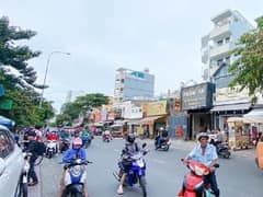 Nhà mặt tiền — Nơ Trang Long, Bình Thạnh — 100m² · ngang 3.8m · 4 tầng — 25 tỷ